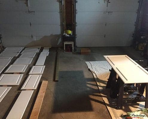 Glossy navy painted cabinets in St. Albert kitchen