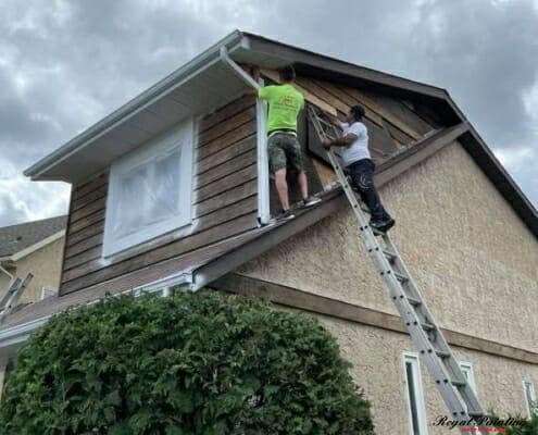 Our Painting Professionals Painting Exterior of the house in Edmonton, AB best exterior painters in edmonton
