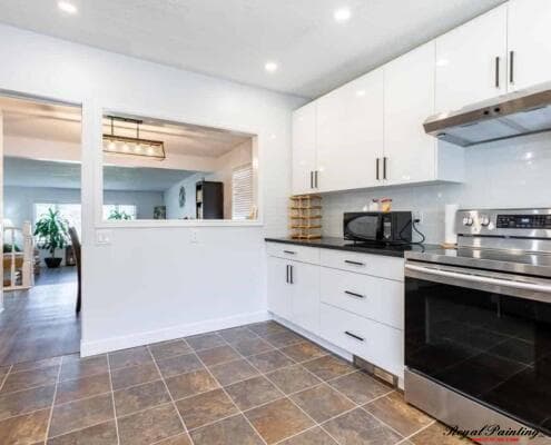 Worn wood cabinets in Sherwood Park kitchen